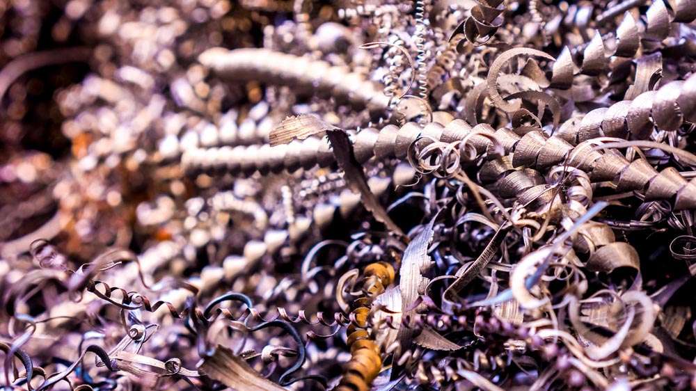 silver spirals of metal shavings as garbage, texture of different size of metal spirals shavings texture, metal shavings texture